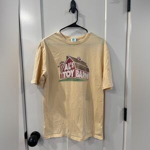 Disney Al's Toy Barn Cream Kids Shirt